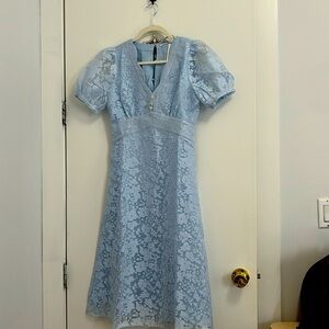 New petite studio dress. No use w/original tag. Beautiful blue dress for summer.